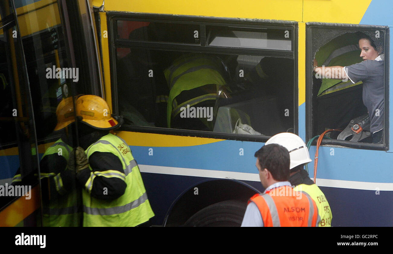 Bus collides with tram in Dublin. Emergency services at the scene of a crash between a Bus and a Luas tram on Dublin's O'Connell Street. Stock Photo