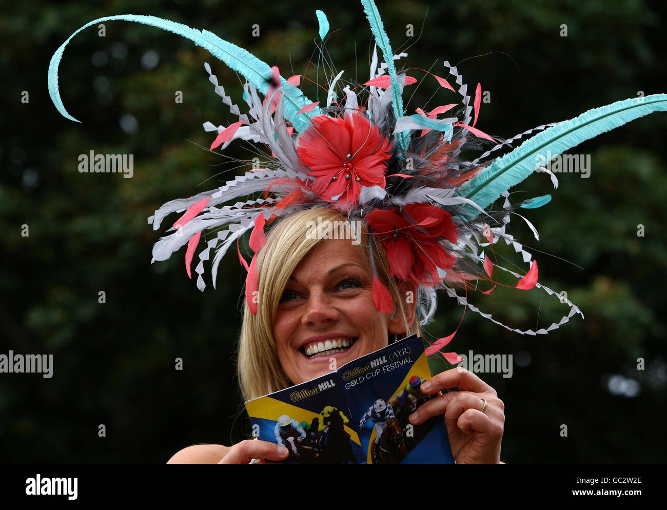 Alison Scott from Symington wearing a hat designed by Rachel Wilkes during the Gold Cup Festival at Ayr Racecourse, Ayr. Stock Photo