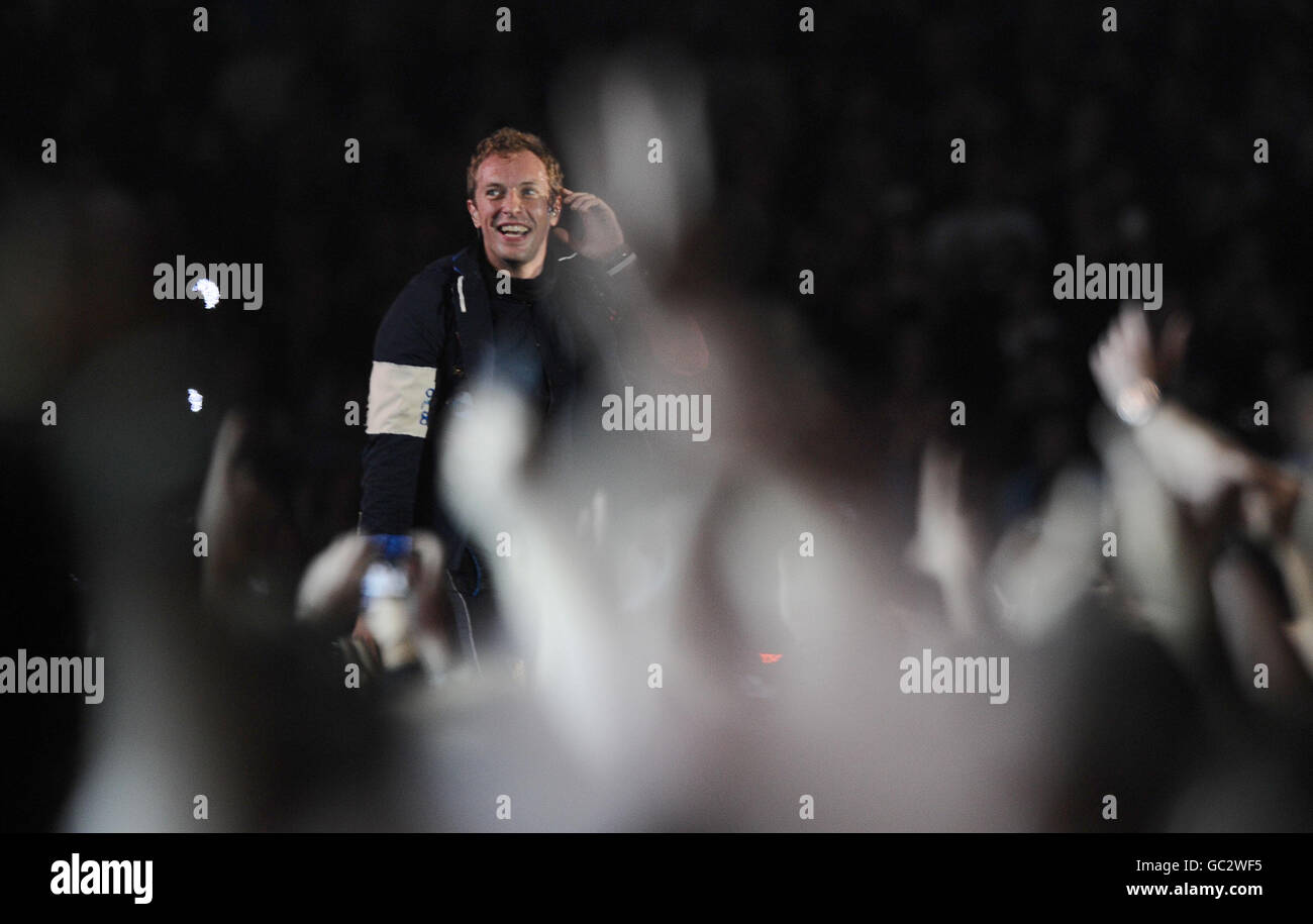 Chris Martin of Coldplay performs at Wembley Stadium, London. Stock Photo