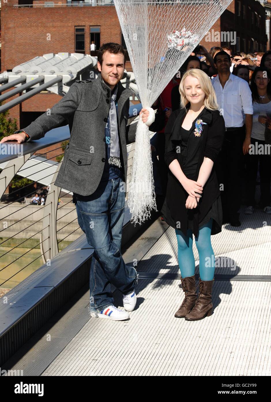 Actor Matthew Lewis (who plays Neville Longbottom) and actress Evanna Lynch (who plays Luna Lovegood) help release 1000 balloons tagged with cards, which will give the lucky recipient the chance to win a trip to the film set of the next Harry Potter film. In central London. Stock Photo