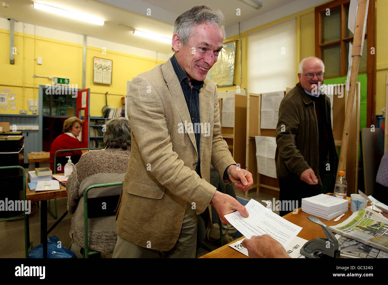 Fine Gael's Richard Bruton cast their vote at the polling station in Drumcondra Boys National School, Drumcondra, Dublin. Stock Photo