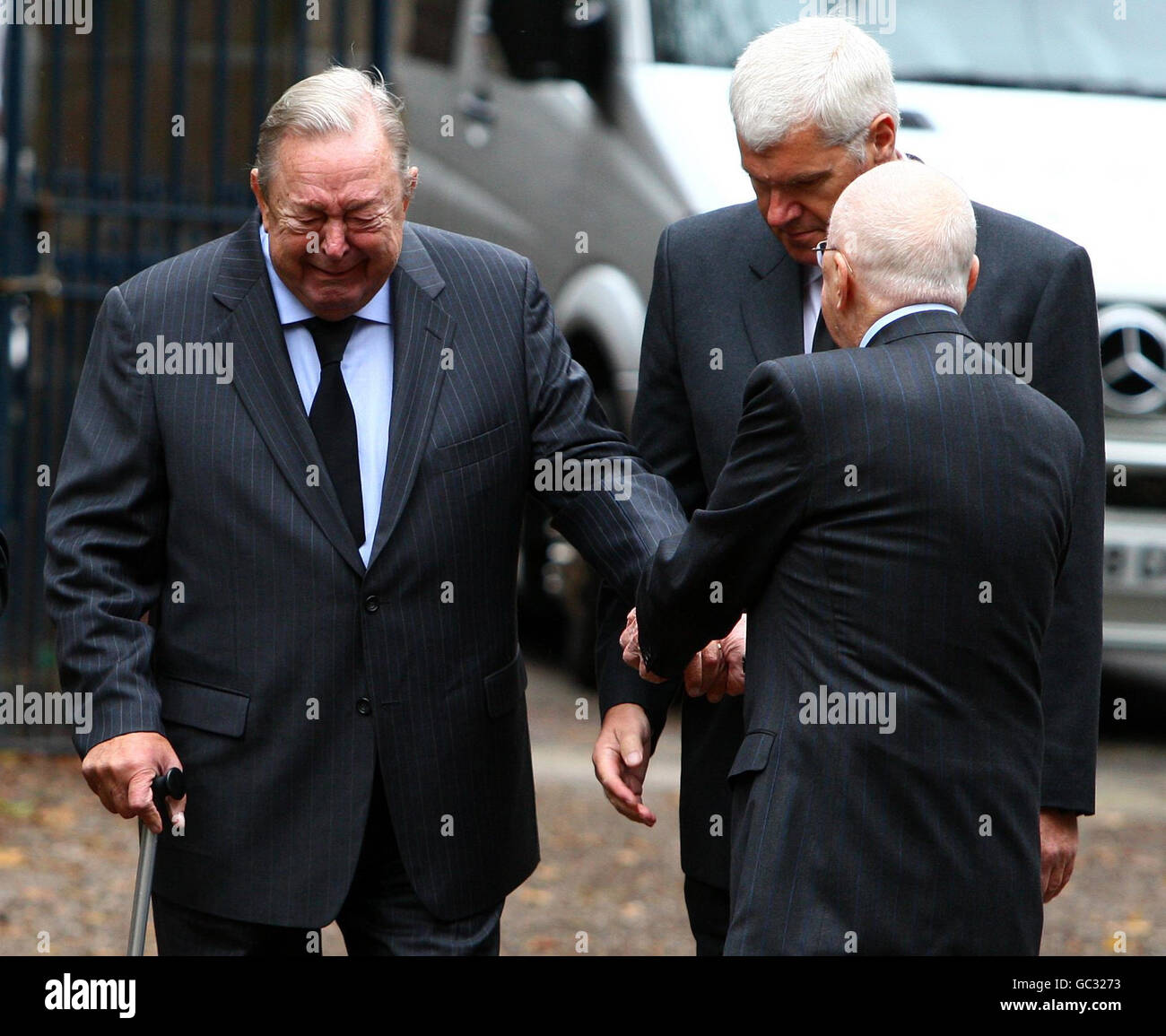 Lennart Johansson (former president of UEFA) is met by Ernie Walker (former Chief Exectutive of