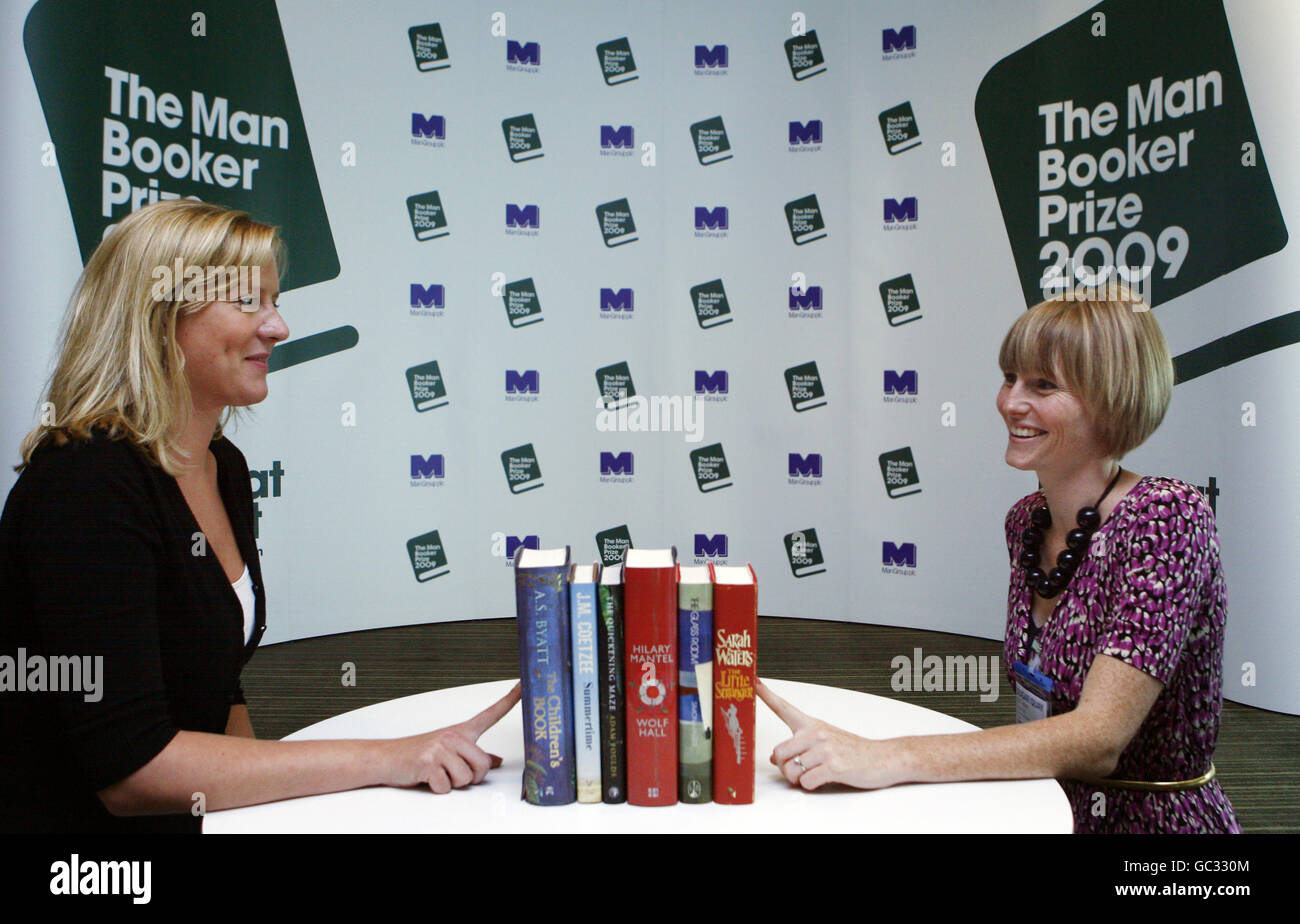 left to right) Colman Getty's Lyndsey Fair and Jill Cotton tend to the six  shortlisted books for the 2009 Man Booker Prize for Fiction that are  announced during a press conference at