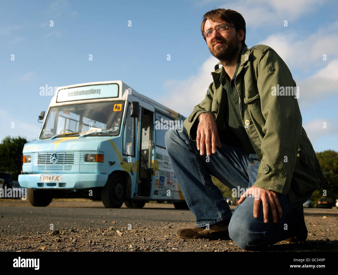 Andy Pag, 34, with his 'Biotruck', a former school bus modified to run on used cooking oil, which he plans to drive around the world. Stock Photo