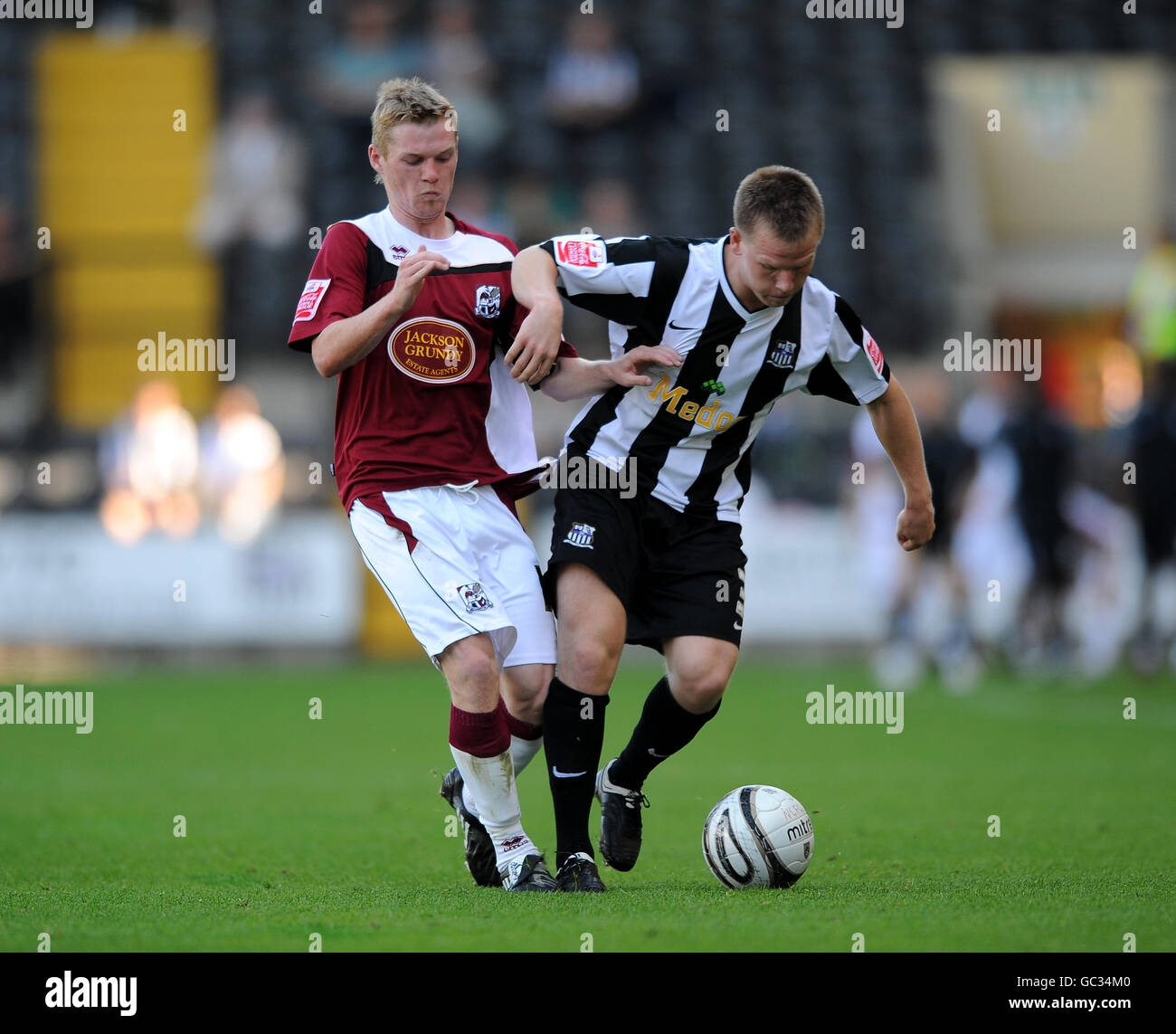 Soccer - Coca-Cola Football League Two - Notts County v Northampton Town - Meadow Lane. Notts County's Matt Ritchie and Northampton Town's Billy McKay Stock Photo