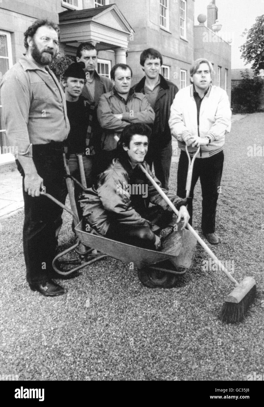 'Auf Wiedersehen Pet' actor Gary Holton (33), who is pictured with the rest of the cast, (he is sitting in the wheelbarrow), has died at an address in North London. Stock Photo