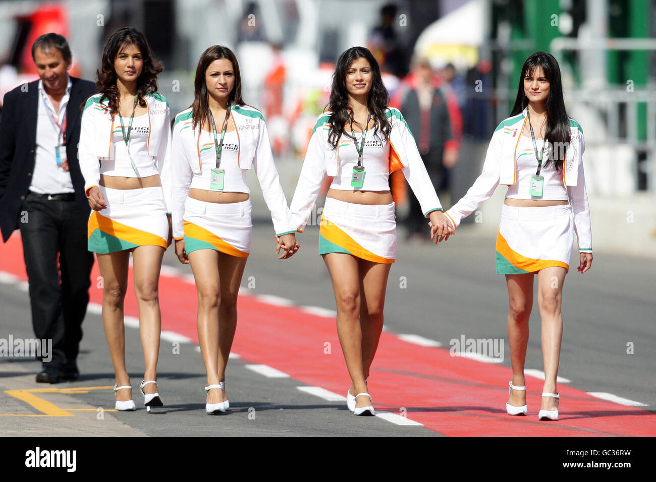 Force India girls in the pit lane during the practice session at Silverstone, Northamptonshire. Stock Photo