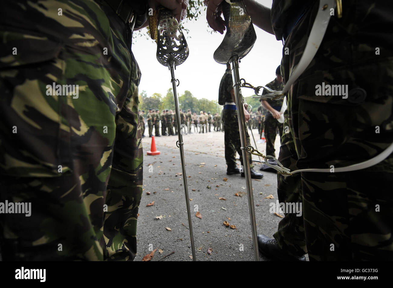 Soldiers rest their ceremonial swords during a rehearsal for a homecoming parade by the British army, to take place on September 17th in the garrison city of Paderborn, Germany. Stock Photo