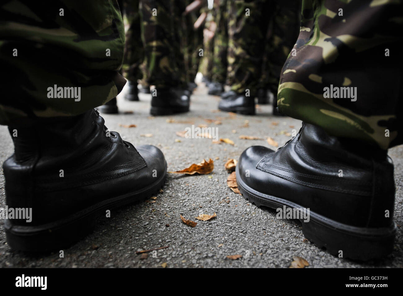 Boots line up in ranks as British army personnel take part in a rehearsal for a homecoming parade on September 17th in the garrison city of Paderborn, Germany. Stock Photo