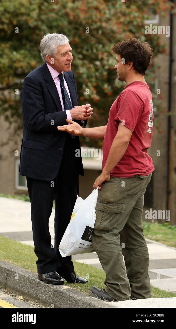 Justice Secretary Jack Straw speaks to a resident during a visit to the Stonecroft estate, in Brighton, Sussex. Stock Photo