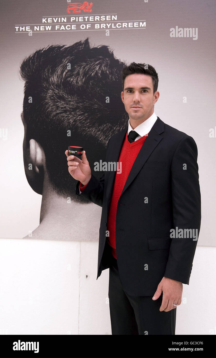 Cricketer Kevin Pietersen poses for photographs as he is unveiled as the new Brylcreem Boy and face of the new Brylcreem product range, at the Future Gallery in central London. Stock Photo