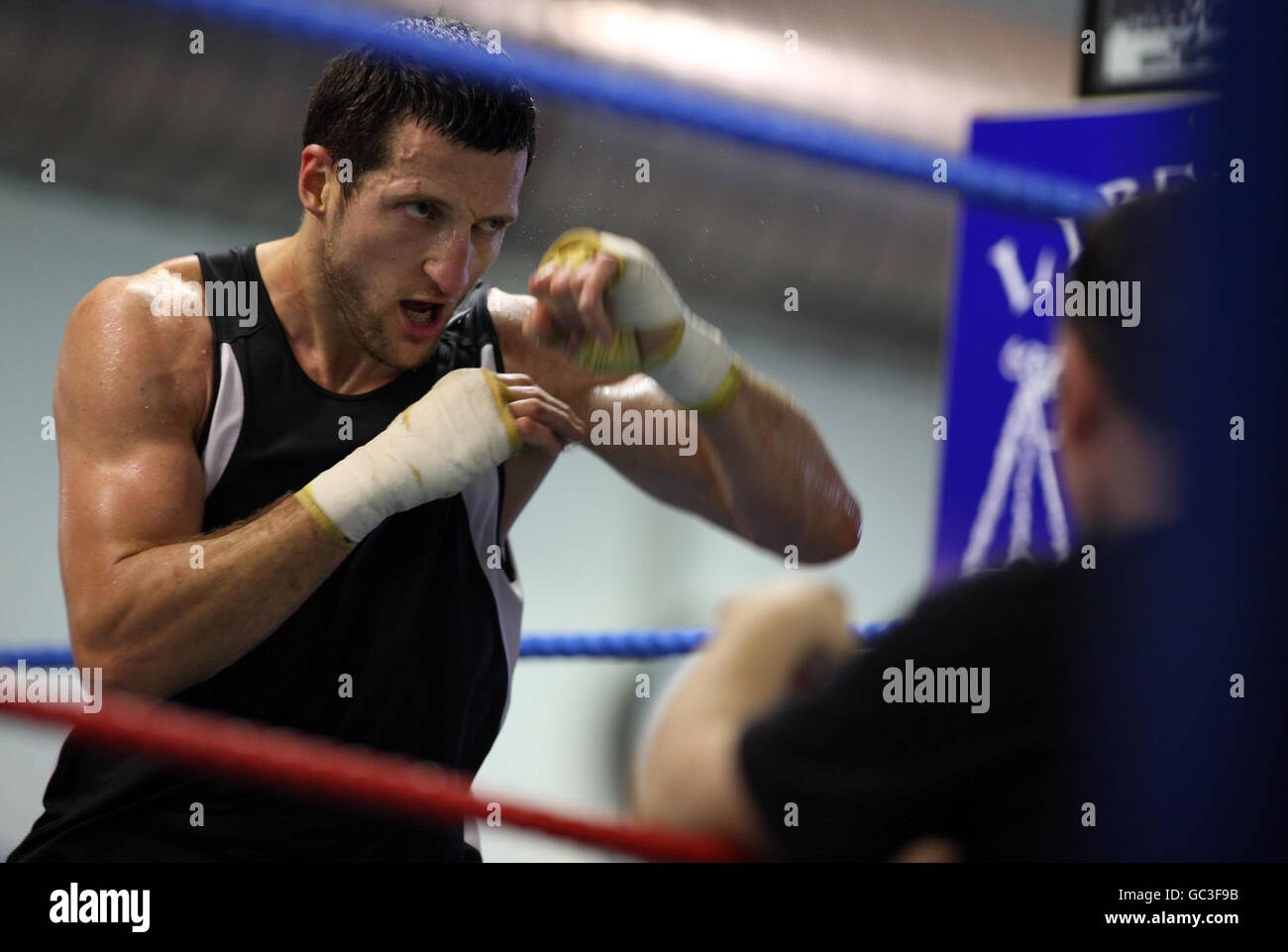 Carl froch shadow boxes during photocall at the liberty gym hires