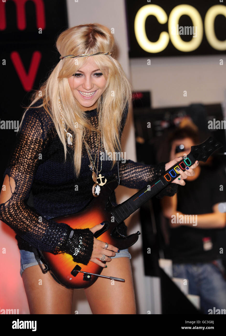 Pixie Lott launches the latest instalment of music making game, Guitar Hero at HMV Oxford Street in central London. Stock Photo