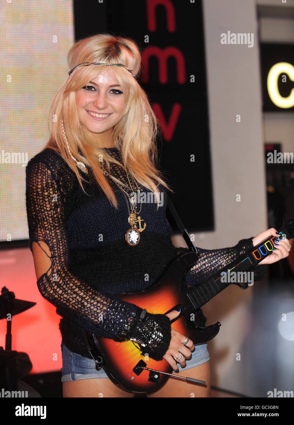 Pixie Lott Guitar Hero 5 photocall - London Stock Photo