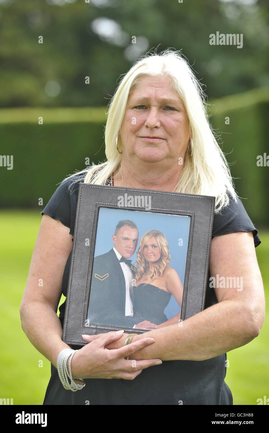 Jane Whitehouse holds a photo of her son, Corporal Jonathan Horne from Walsall, after seven mothers, whose fallen sons who were all killed in Afghanistan, hold a press conference in Redwood Lodge, Failand, Bristol, as they come together to form a charity called Afghan Heroes. Stock Photo