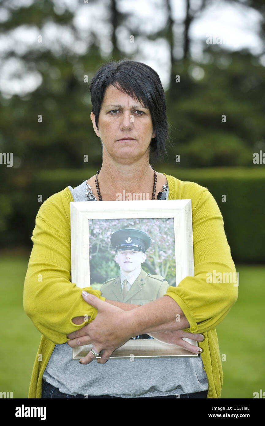 Sharon Backhouse holds a picture of her son Rifleman James Backhouse from Castleford, Yorkshire, after seven mothers, whose fallen sons who were all killed in Afghanistan, hold a press conference in Redwood Lodge, Failand, Bristol, as they come together to form a charity called Afghan Heroes. Stock Photo