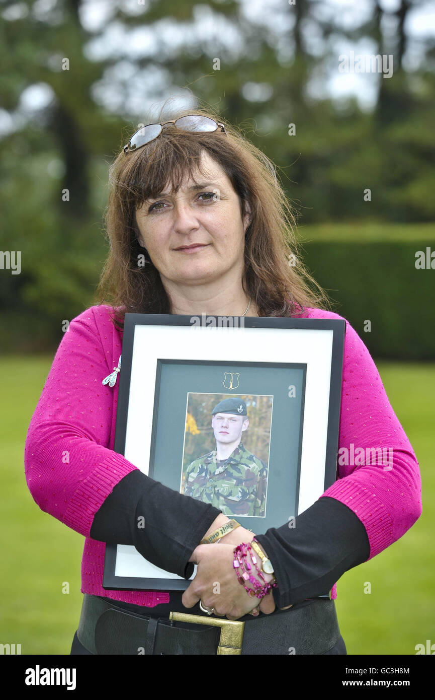 Lucy Aldridge holds a photo of her son, Rifleman William Aldridge from Herefordshire, after seven mothers, whose fallen sons who were all killed in Afghanistan, hold a press conference in Redwood Lodge, Failand, Bristol, as they come together to form a charity called Afghan Heroes. Stock Photo