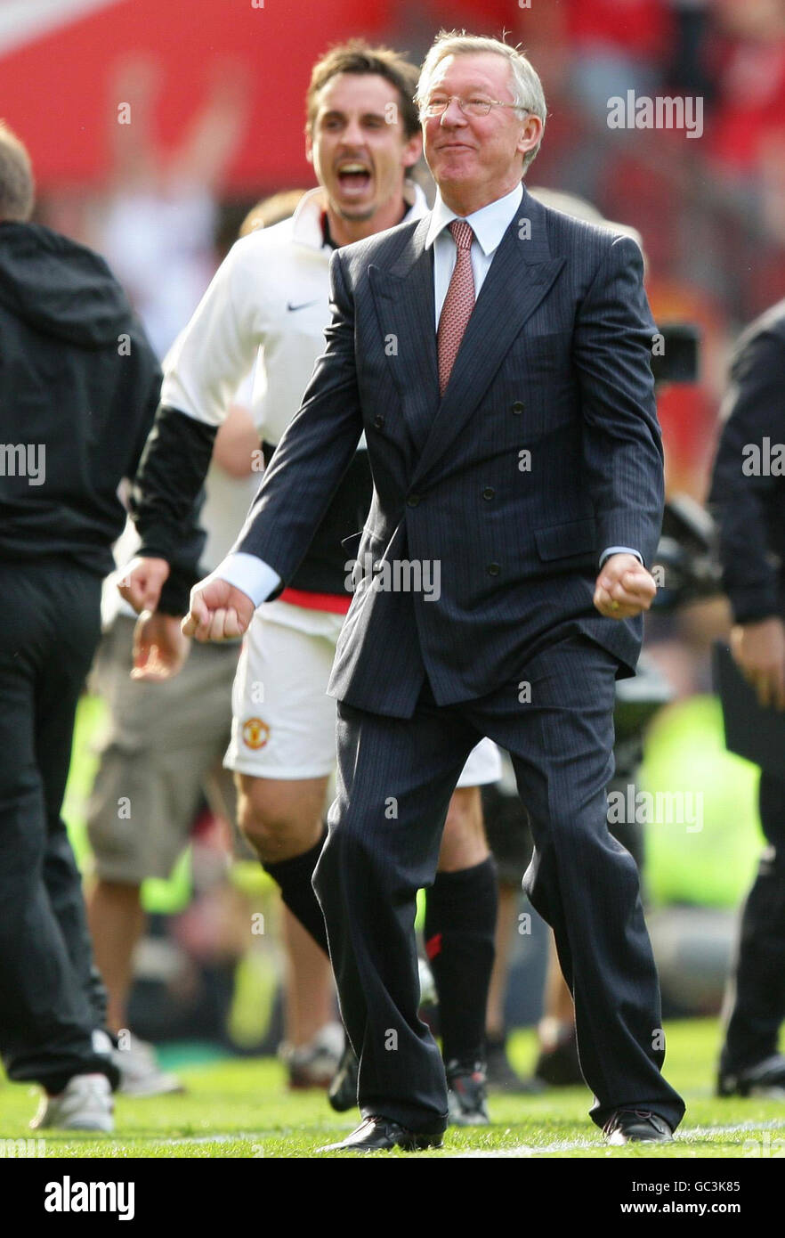 Manchester United manager Sir Alex Ferguson and Gary Neville celebrate ...