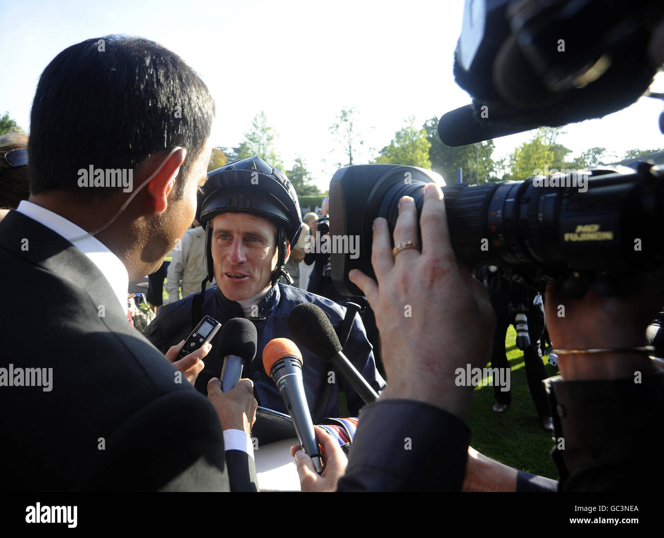 Johnny Murtagh is interviewed after winning The Queen Elizabeth II Stakes on Rip Van Winkle during the Third Ascot Racecourse Beer Festival at Ascot Racecourse, Ascot. Stock Photo