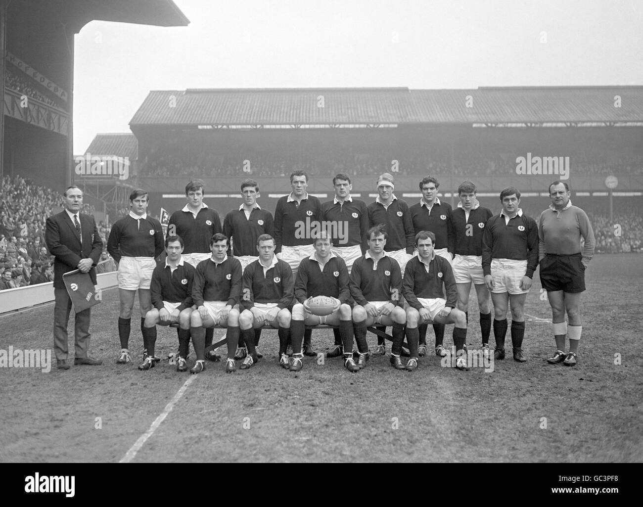 The Scotland team, standing left to right; DH Collier (touch judge); Gordon Connell; Sandy Carmichael; Wilson Lauder; Alistair McHarg; Peter Brown; Rodger Arneil; John Frame; Billy Steele; Ian McLauchlan; M Charles Durand (referee). Sitting, left to right; Ian Robertson, Colin Blaikie; William Jackson; Jim Telfer; Frank Laidlaw and Colin Telfer. Stock Photo