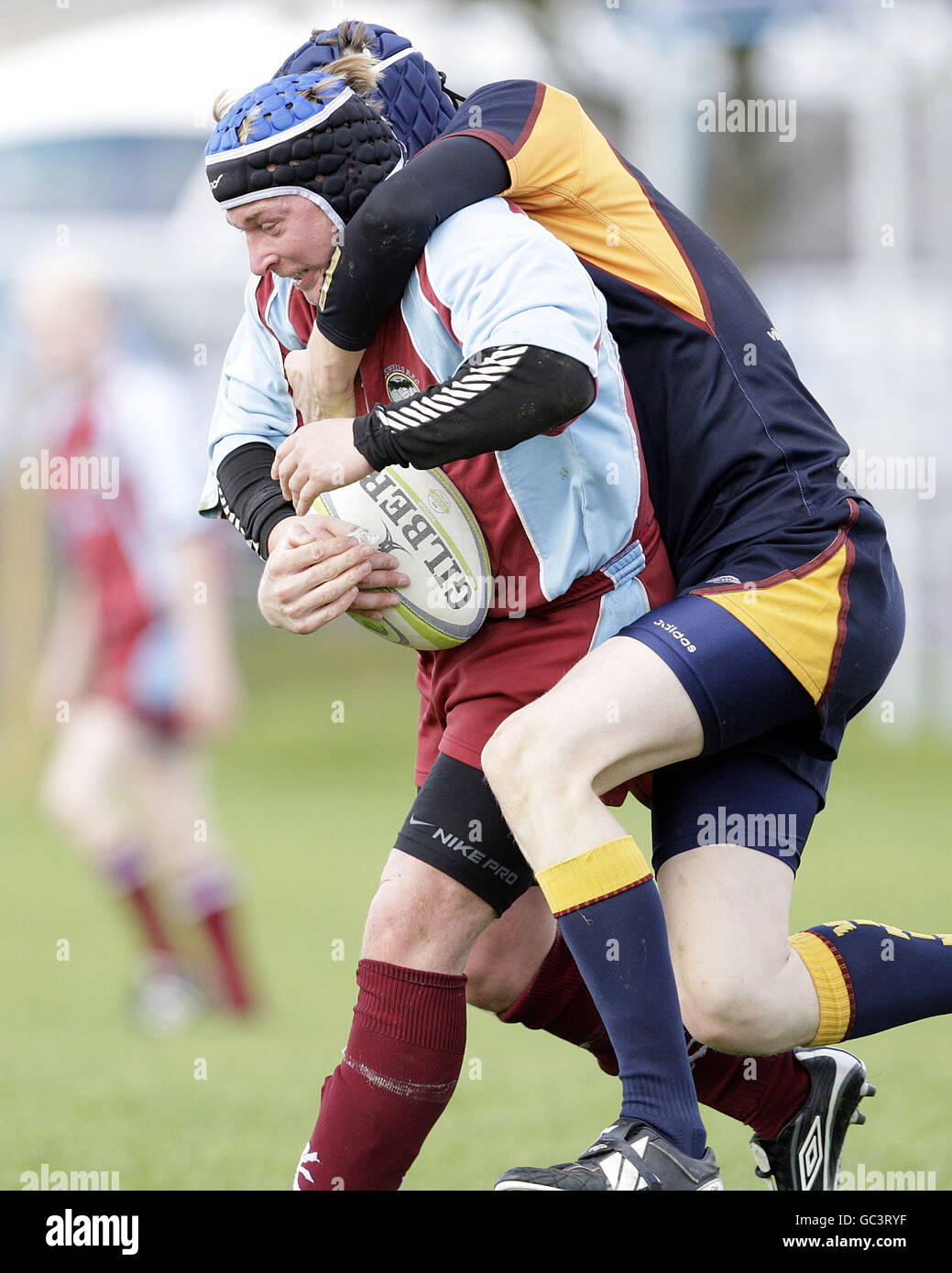 Rugby Union - Scottish Hydro East - St Boswells v Queensferry - St Boswells. St Boswells' Scott Elliot (left) is tackled by Queensferry's Simon Bowers in the Scottish Hydro East 2 match at St Boswells, Melrose. Stock Photo