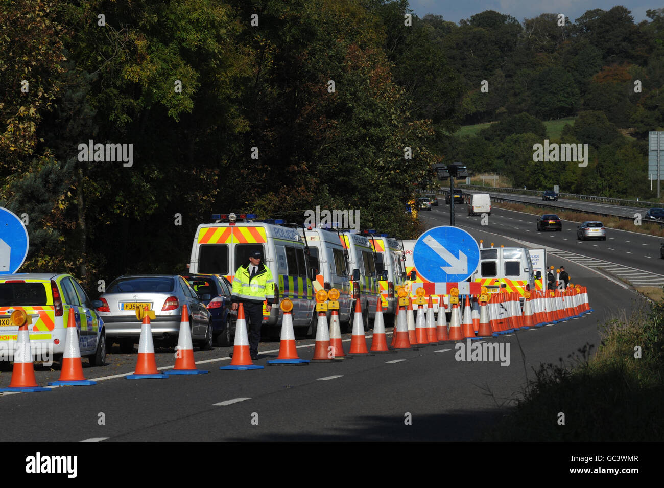 Police officers at the scene on the M5 slip road at junction 14, north