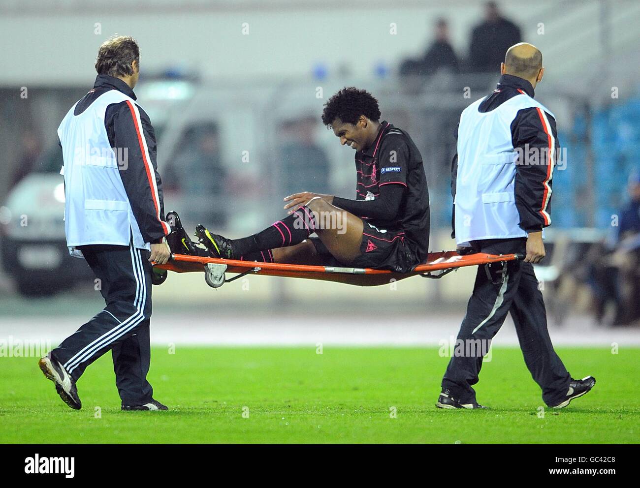 Everton's Joao Alves Jo is stretchered off after being fouled by FC BATE Borisov's Dmitry Likhtarovich Stock Photo