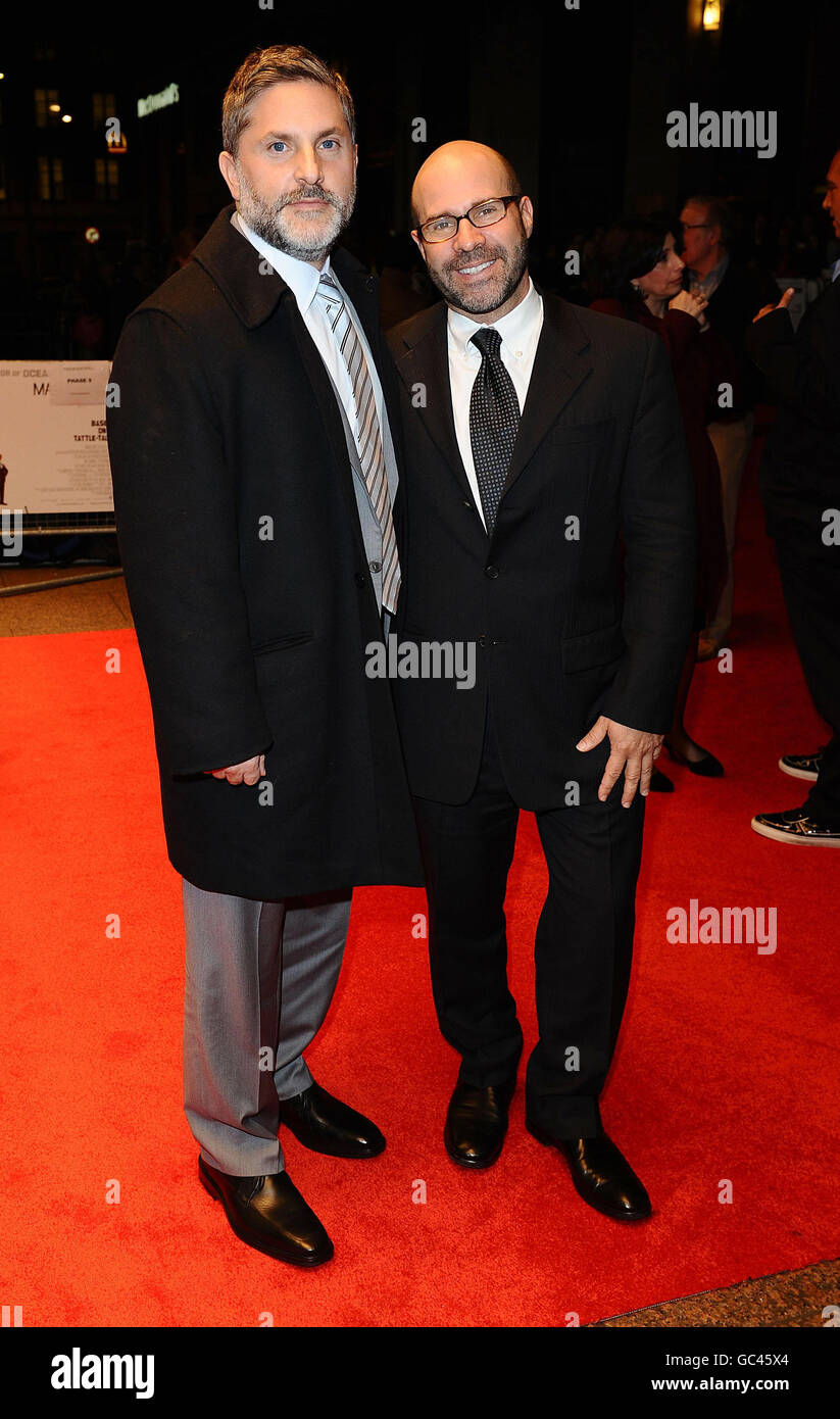 (from left to right) Producer, Gregory Jacobs and Screenwriter, Scott Burns arrive at the premiere of The Informant, during the London Film Festival, at the Odeon West End in Leicester Square, London. Stock Photo