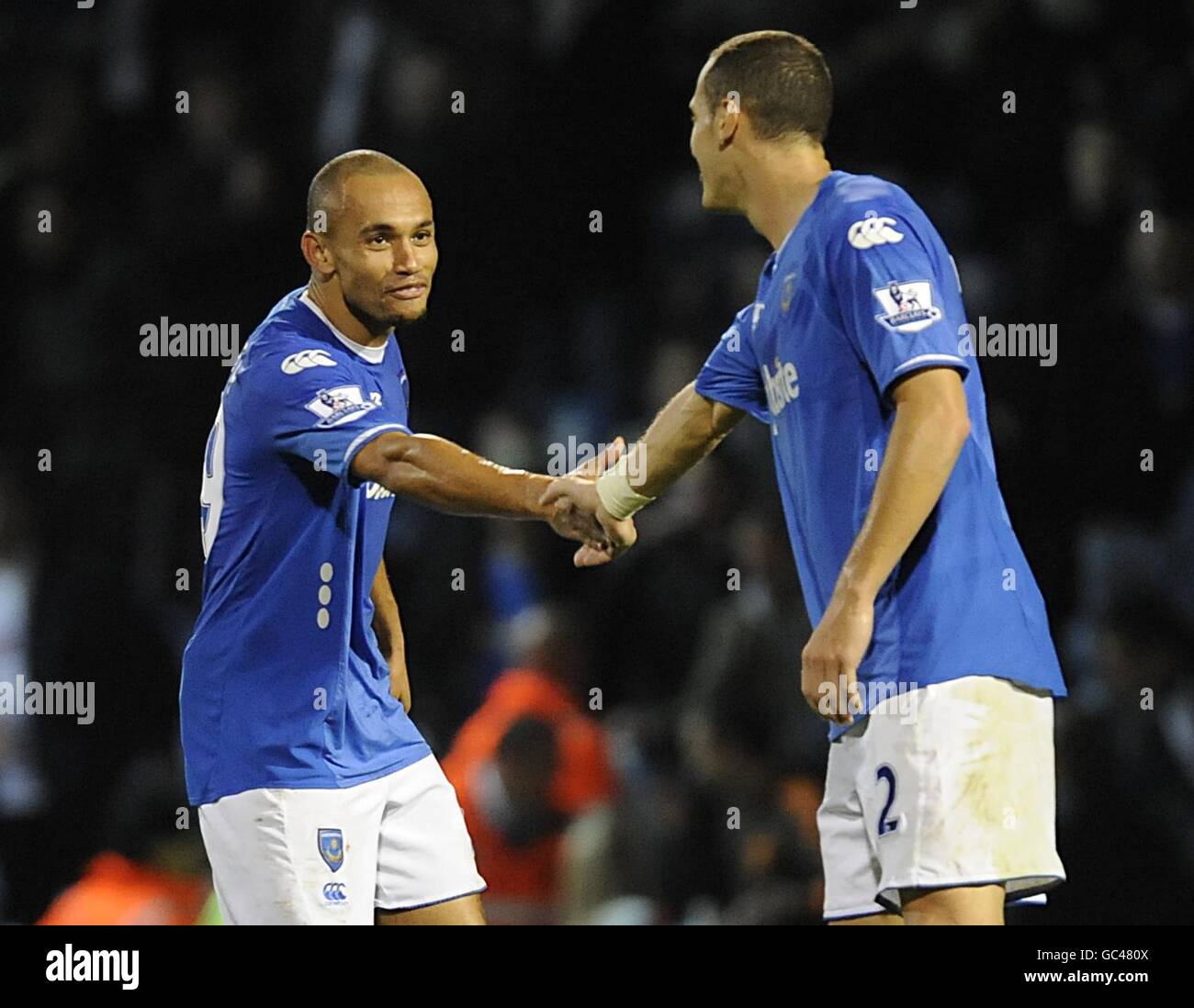 Portsmouth's Danny Webber (left) ceclebrates scoring their second goal with team mate Hassan Yebda (right). Stock Photo