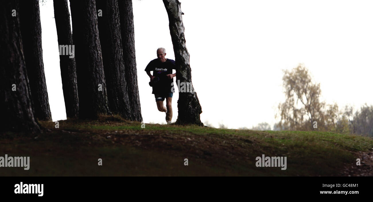 A runner enjoys the autumn colours in Sutton Park, Sutton Coldfield