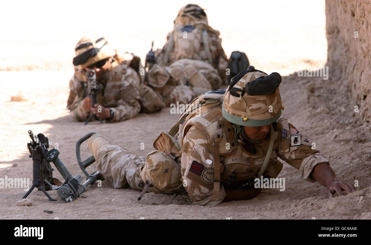 Members of the Gurkha Engineers on a training exercise searching for improvised explosive devices (IEDs) at Camp Bastion in Afghanistan. Stock Photo
