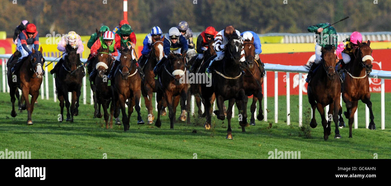 Charm School ridden by Jimmy Fortune (second right) goes clear to win the totesport.com November Handicap (Heritage) at Doncaster Racecourse. Stock Photo