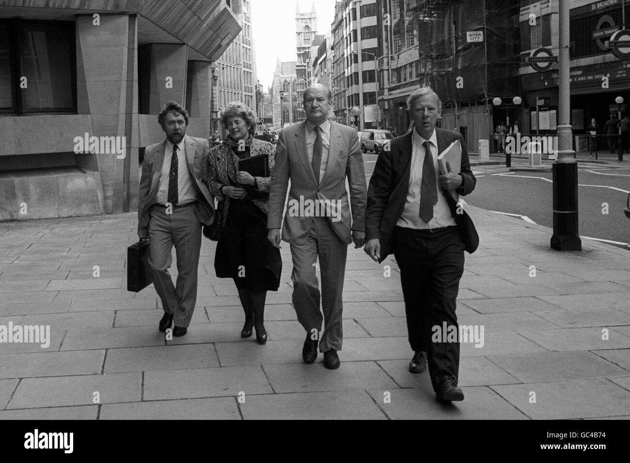 SOGAT '82 members Brenda Dean (General Secretary) and George Hoodlees (l) arrive with MPs Ron Leighton and Peter Shore (r) at the Home Office for talks about the Wapping dispute between the Print Unions and News International. Stock Photo
