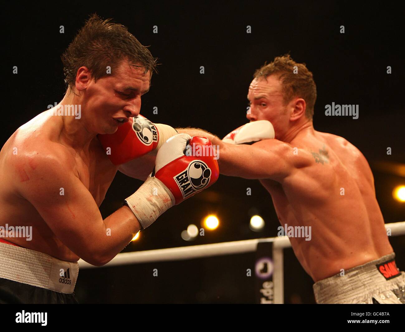 England's George Groves (right) on top against Bulgaria's Konstantin Makhankov during the undercard fight prior to the WBA World Heavyweight title fight between David Haye and Nikolai Valuev, at the Nuremberg Arena, Germany Stock Photo