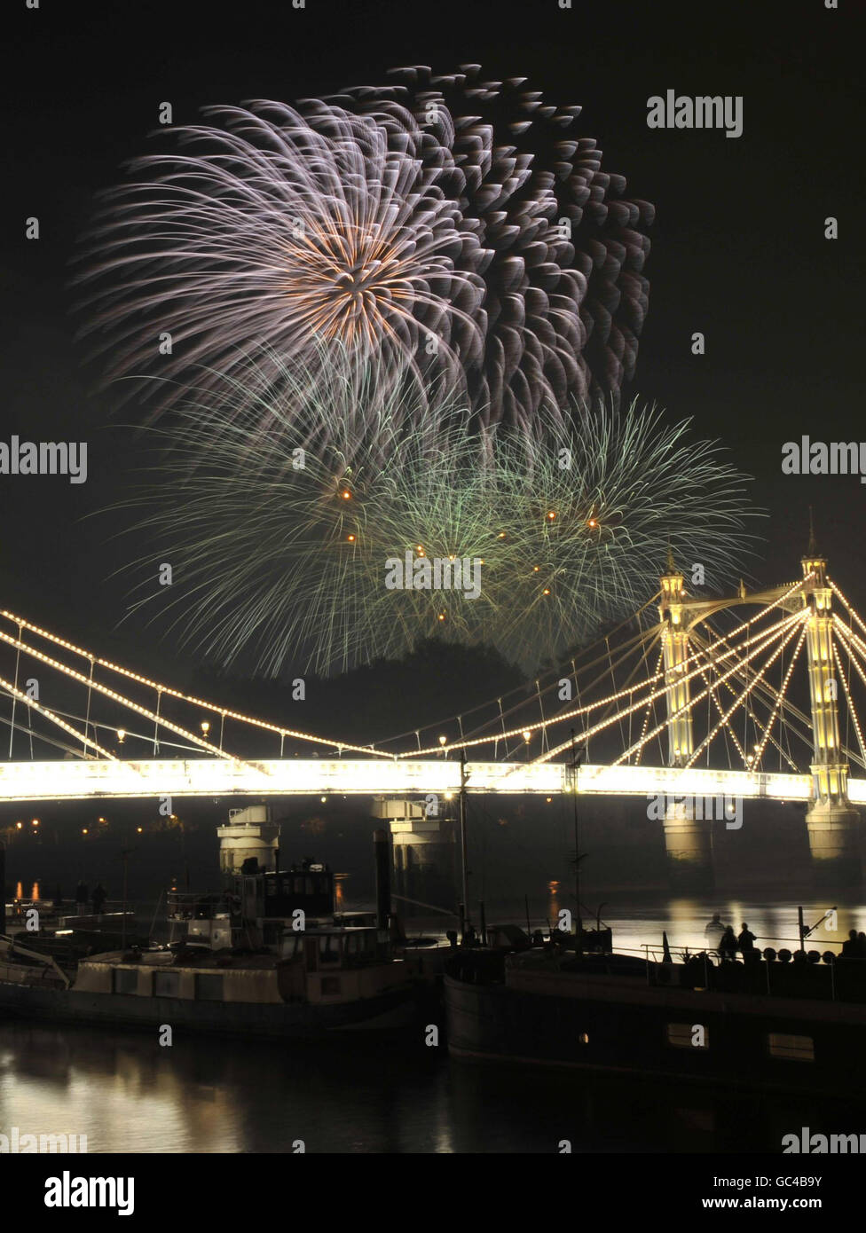 The Battersea Park fireworks over the Albert Bridge in London. Stock Photo
