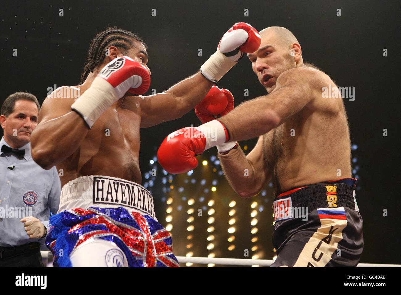 England's David Haye (left) and Russia's Nikolai Valuev trade blows during the WBA World Heavyweight title fight at the Nuremberg Arena, Germany Stock Photo