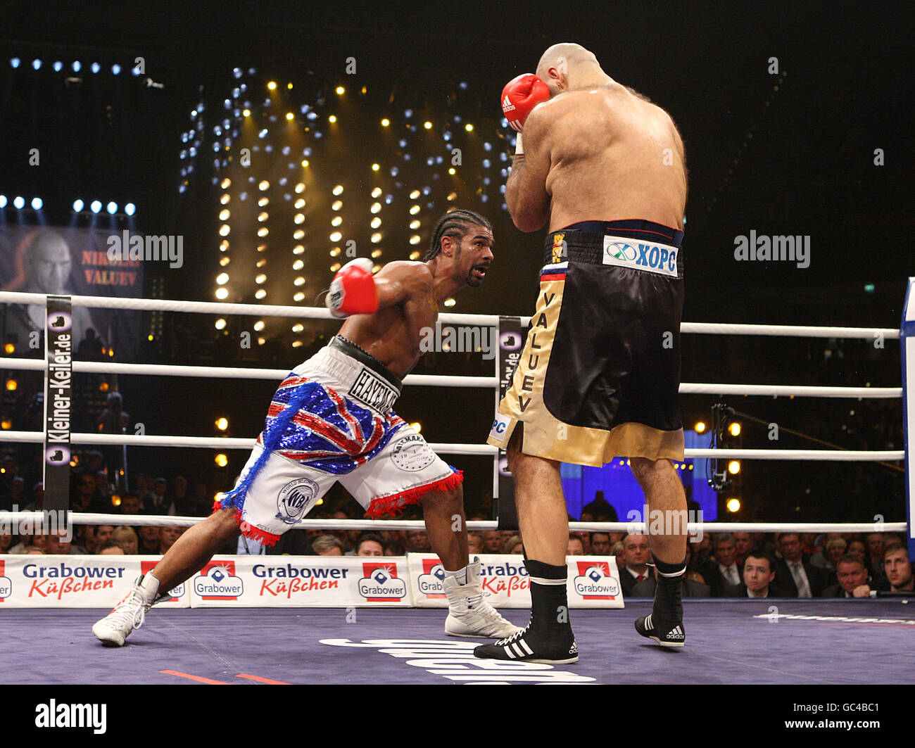 England's David Haye (left) on the attack against Russia's Nikolai Valuev during the WBA World Heavyweight title fight at the Nuremberg Arena, Germany. Haye was to win the fight on points. Stock Photo