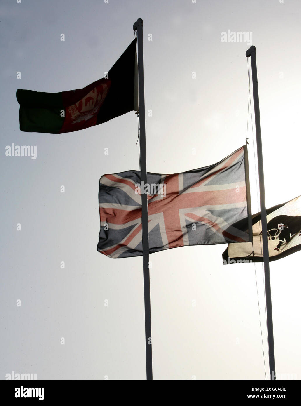 Flags fly at half mast at the Main British Operations Base for Task