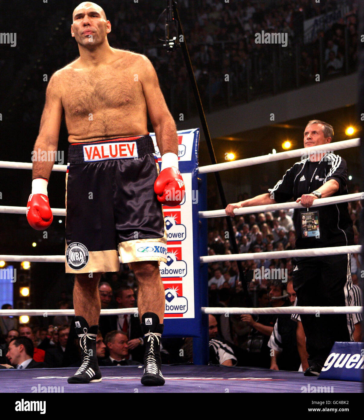 Russia s Nikolai Valuev Stands His 7ft 2 Inch Tall As His Cornerman 