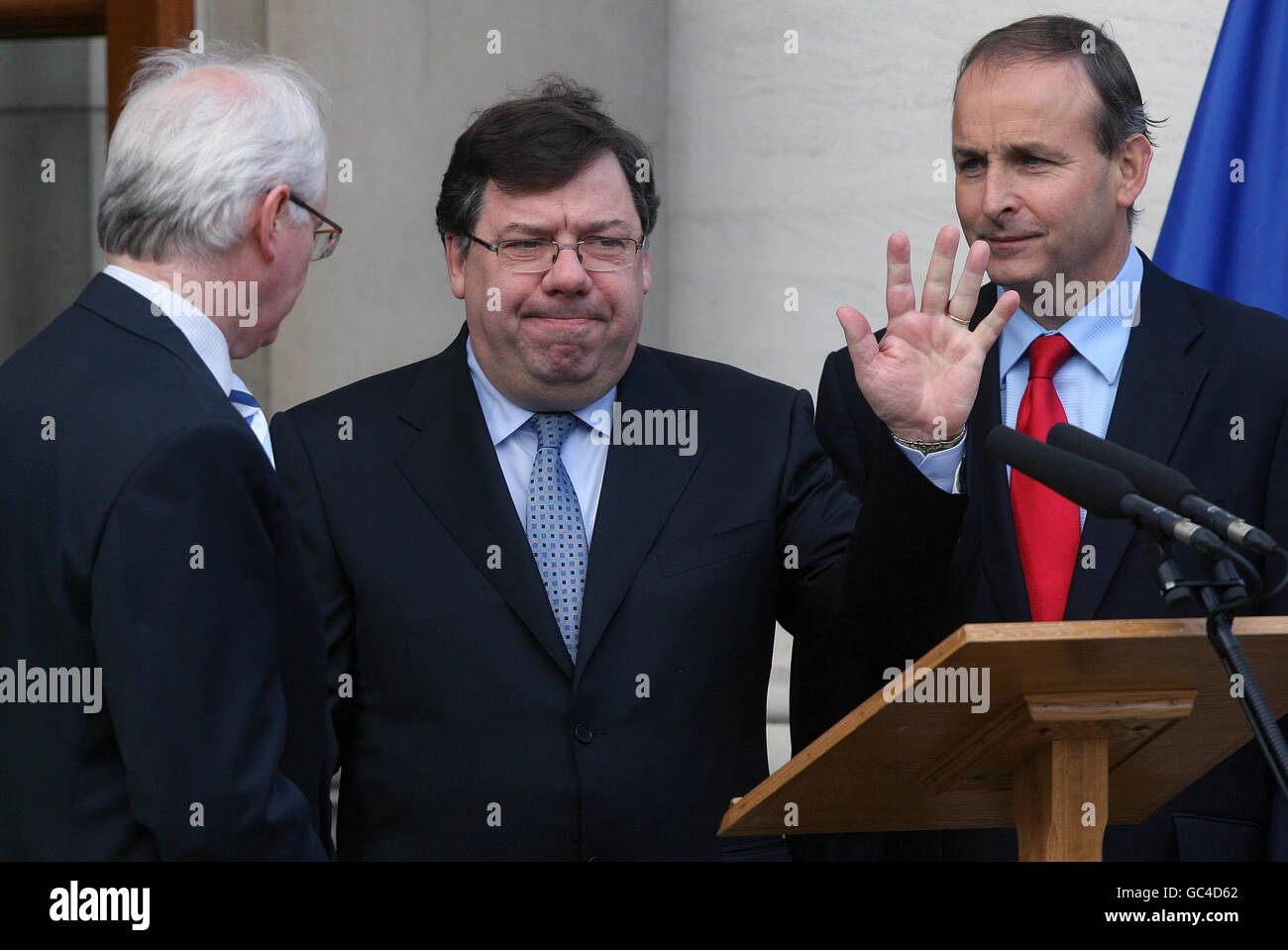L-R Enviroment Minister John Gormley Taoiseach Brian Cowen and Foreign Affairs Minister Micheal Martin speaking to the media after claiming victory in the Lisbon Treaty referendum at Government Buildings in Dublin. Stock Photo