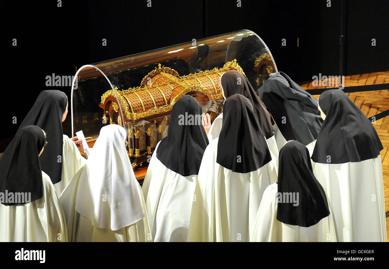 Visiting nuns venerate the relics of St Therese of Lisieux inside ...