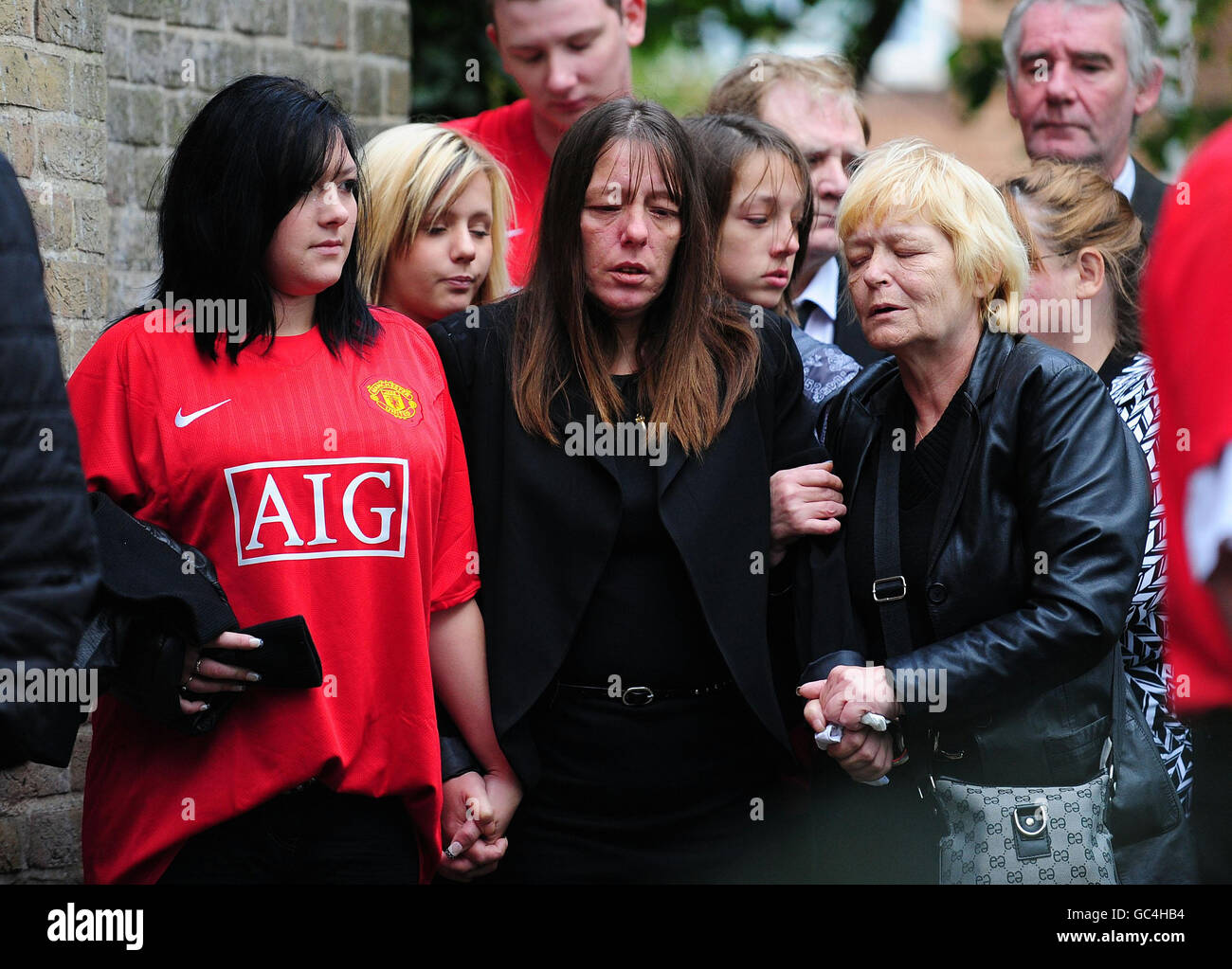 Mother Sharon Hamilton (centre) arrives for the funeral of her son 10-year-old Sean Hamilton at Our Lady's Church, York. Stock Photo