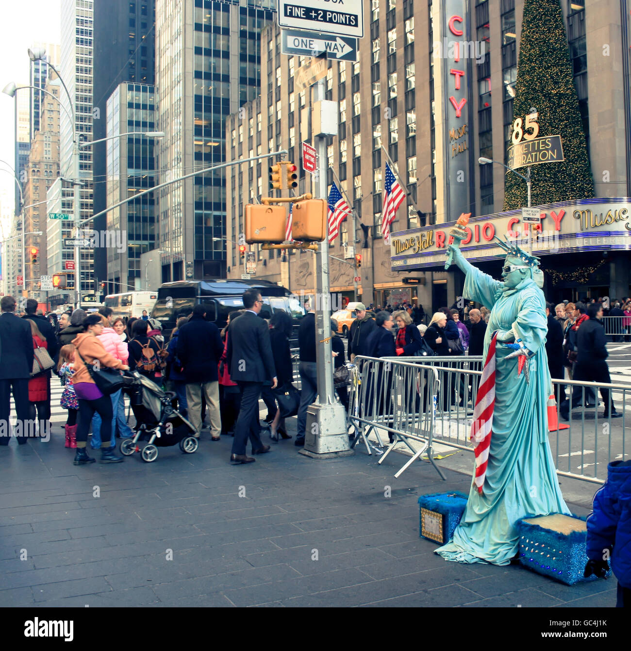 Statue of liberty mime performer by Radio City Music Hall in midtown