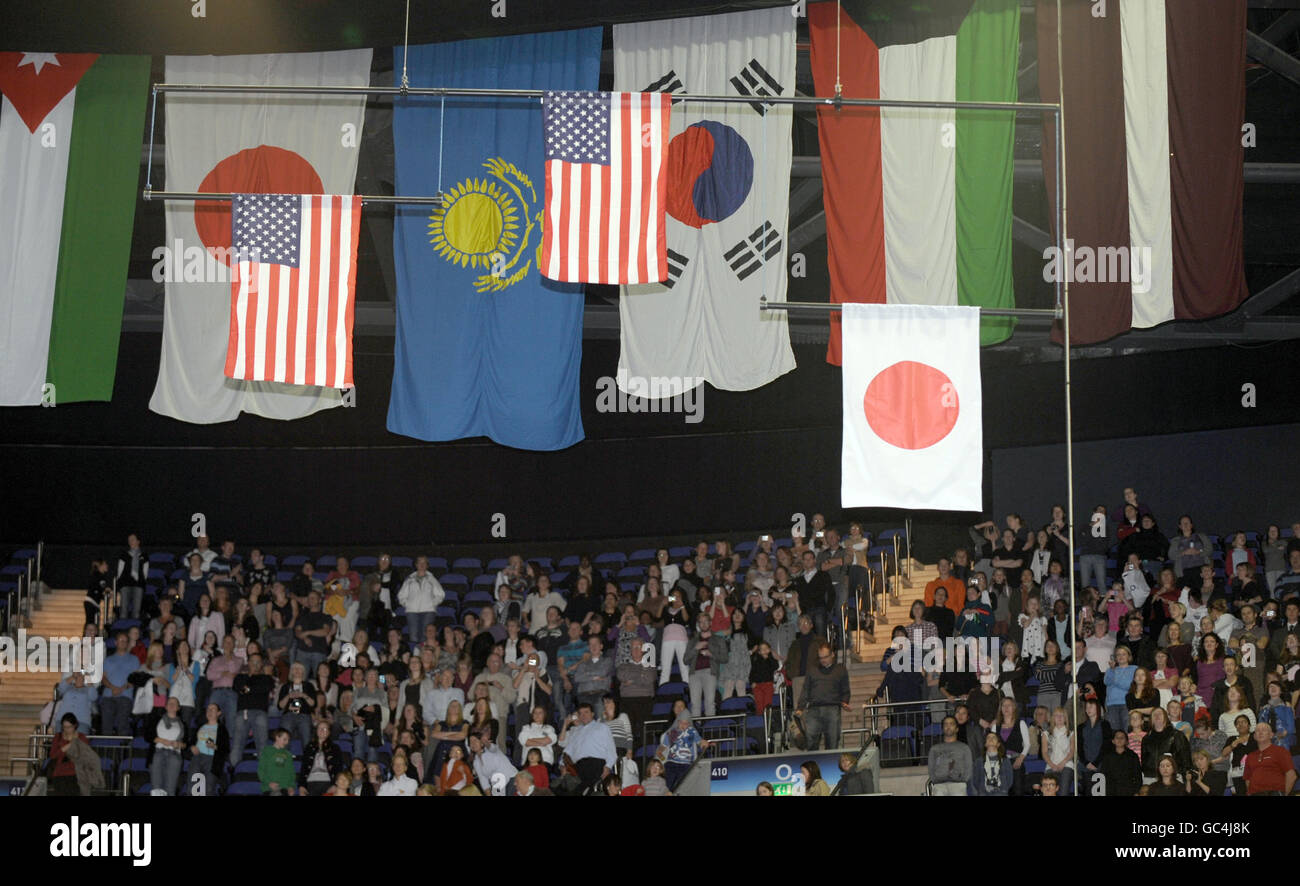 Flags are raised during the medal ceremony following the Women's