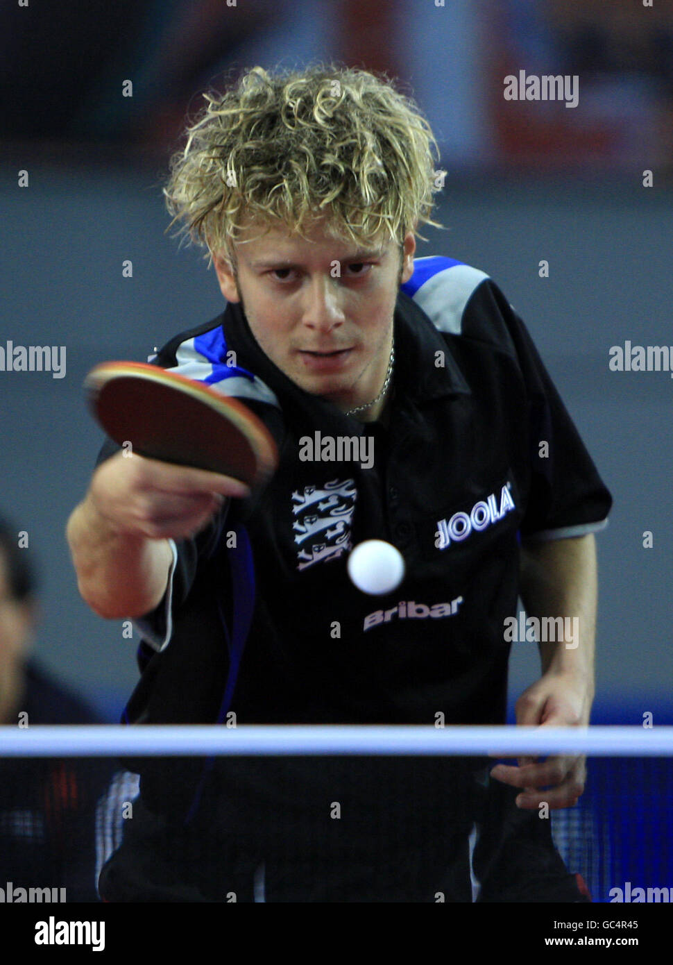 Table Tennis - English National Championships - English Institute of Sport - Sheffield. England's Andrew Baggaley serves Stock Photo