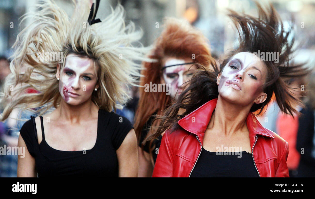 Gemma McKee leads the Scottish Rockettes in a recreation of Michael Jackson's Thriller music video on Buchanan Street in Glasgow to promote a Halloween themed night at the Karibu Klub. Stock Photo
