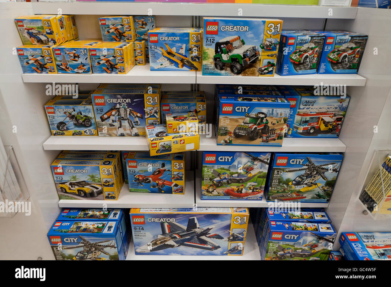 LEGO toys on display on shelves at toy store - USA Stock Photo