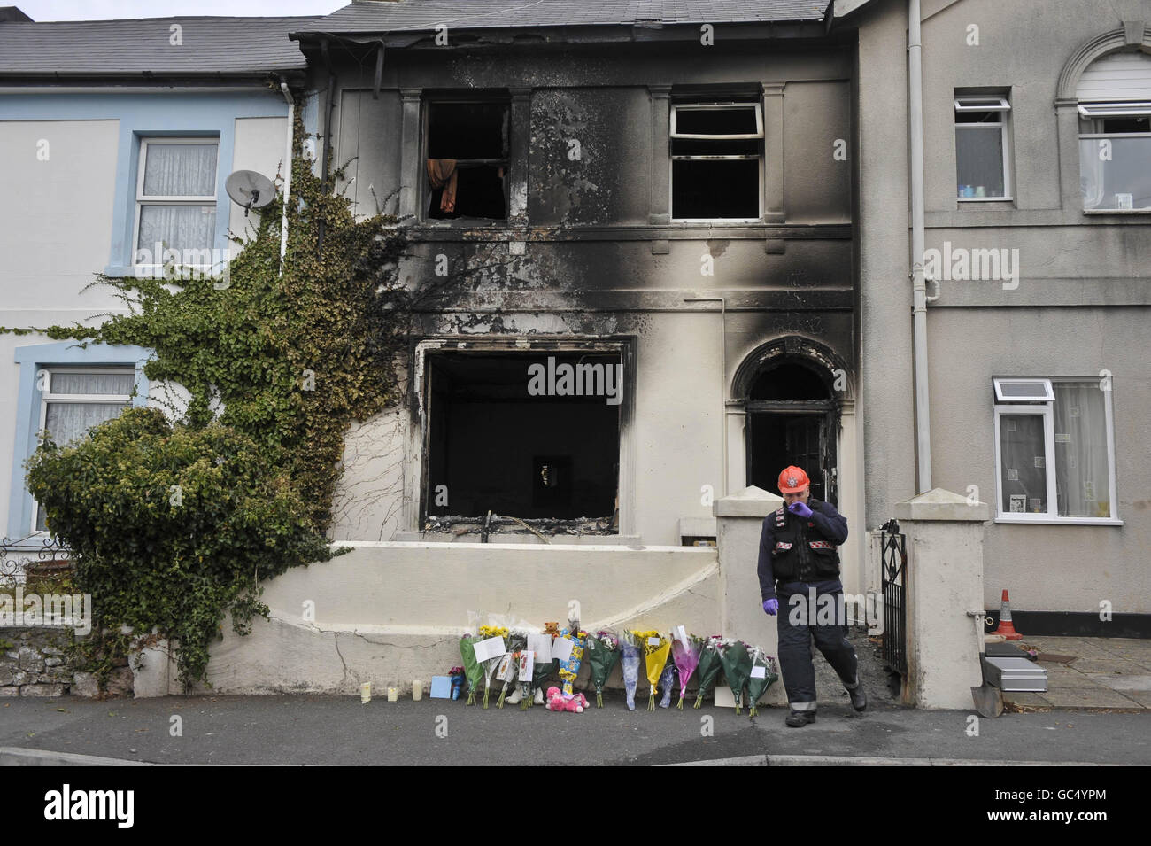Firefighter outside house on church road in torquay hires
