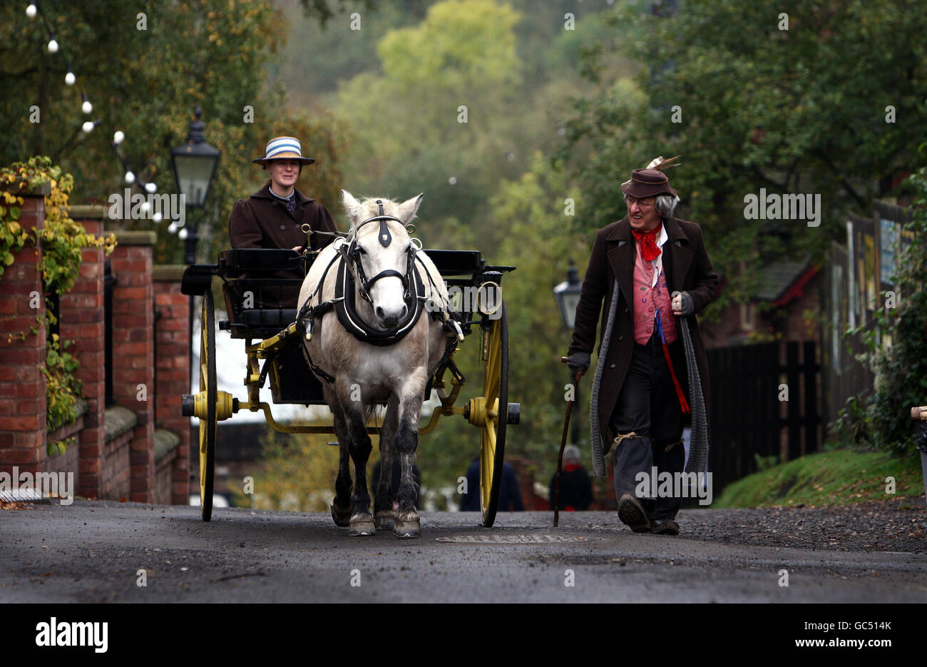 Amy Holmes and Keith Minshull walk 'Jenny' the pony to Blists Hill Victorian Village, Ironbridge, Shropshire today. Stock Photo