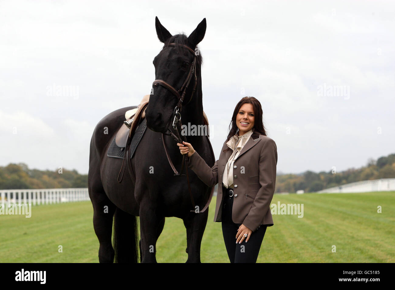 Toni Terry holds Deadnought from the Household Cavalry during a photocall to launch 'Horses For Heroes' in aid of Help For Heroes at Ascot Racecourse in Berkshire. Stock Photo